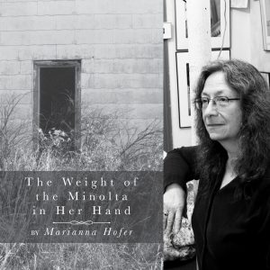 The Weight of the Minolta in Her Hand by Marianna Hofer